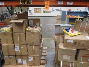 LOT TO INCLUDE: LARGE QUANTITY OF RAIN COATS, RAIN PANTS, AND COVERALLS.. LOADING & HANDLING FEE $15-4216